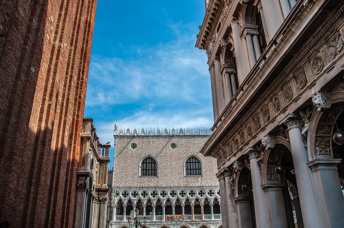 The Doge's Palace seen between the St. Mark's Bell Tower and the Marciana Library - Venice - Veneto, Italy - rossiwrites.com