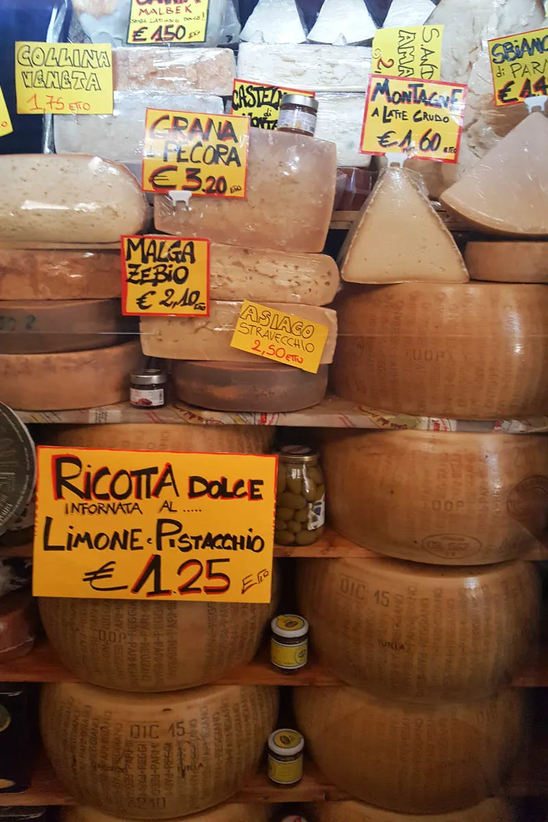 A cheese selection gracing a deli window - Padua, Veneto, Italy - rossiwrites.com