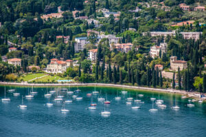 A view of Lake Garda with the marina of Garda Town - Rocca di Garda, Lake Garda, Italy - rossiwrites.com
