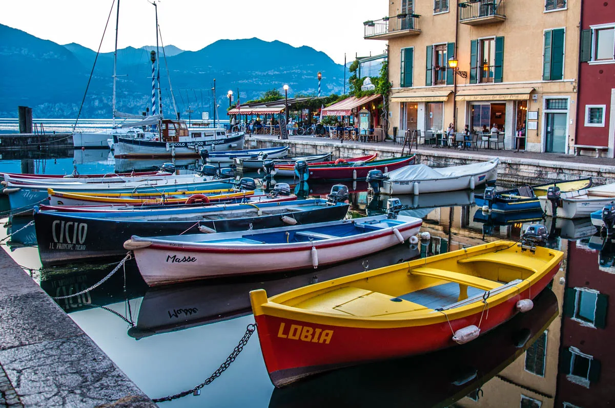Colourful boats in the small harbour - Castelletto sul Garda, Veneto, Italy - rossiwrites.com