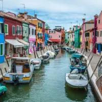 Colourful houses and boats alongside a canal - Burano, Veneto, Italy - rossiwrites.com
