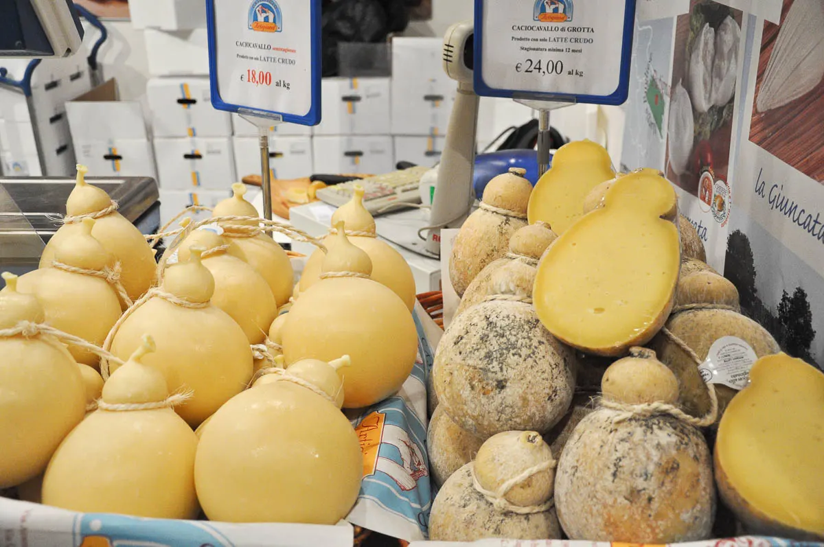 Market stall selling artisan cheese - Vicenza, Italy - rossiwrites.com