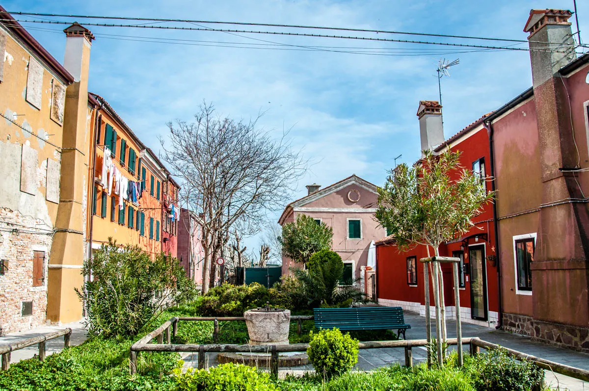 Small square with colourful houses - Pellestrina, Veneto, Italy - rossiwrites.com