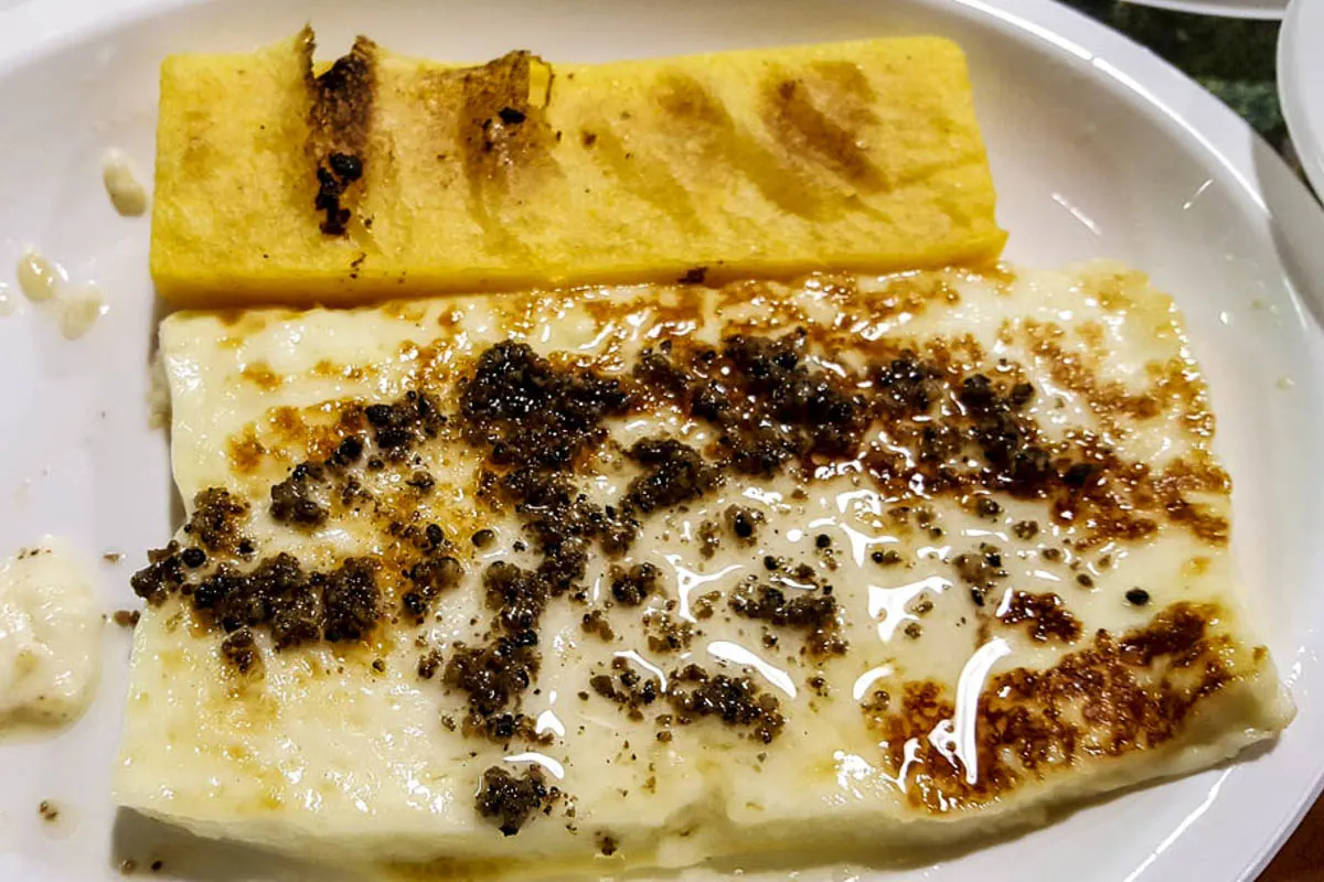 Tosella cheese with truffles and polenta - Lumignano, Veneto, Italy - www.rossiwrites.com