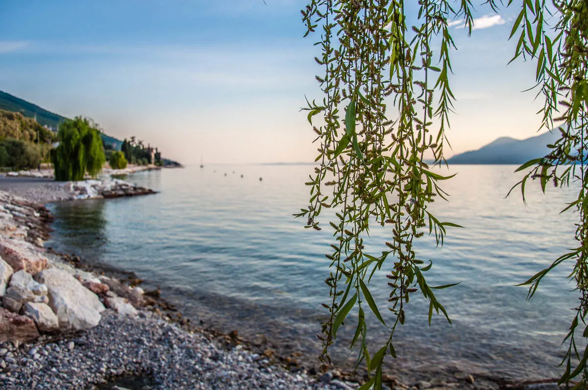 The lake seen with the promenade and the beach of Castelleto sul Garda - Lake Garda, Veneto, Italy - rossiwrites.com