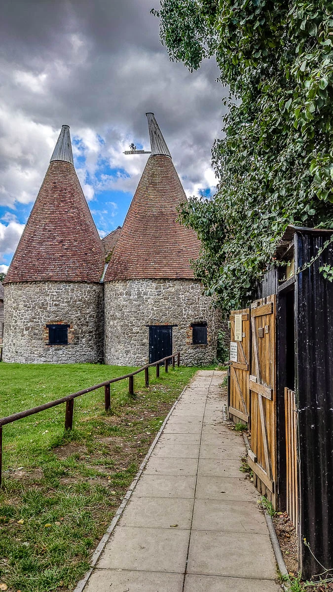 The oast house with the hoppers' huts - Kent Life - Maidstone, Kent, England - rossiwrites.com