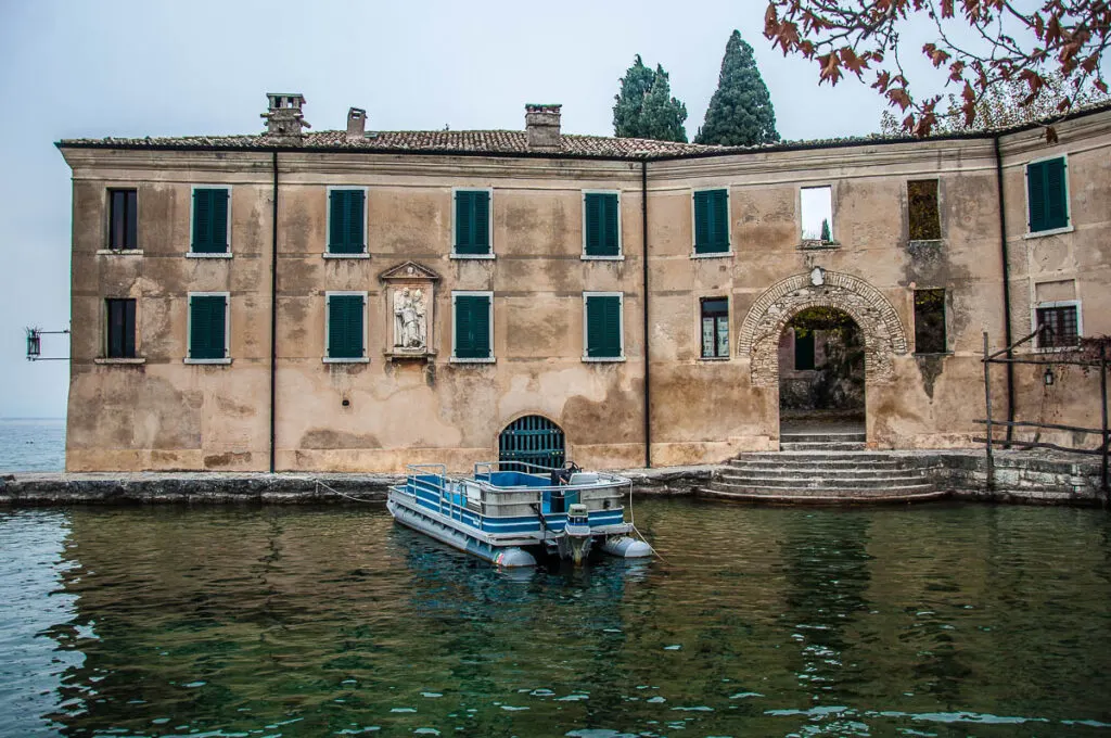 Locanda di San Vigilio with the boat for guests - Punta di San Vigilio - Lake Garda, Italy - rossiwrites.com