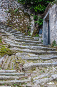 Steep stairs with a house door - Nesso - Lake Como, Italy - rossiwrites.com