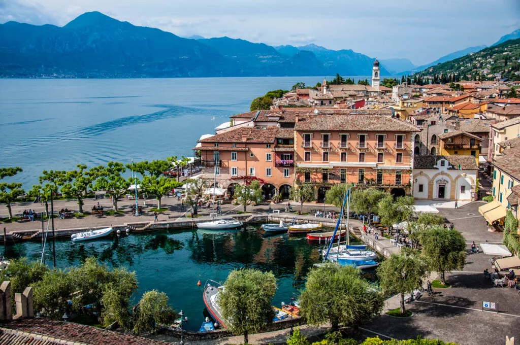 View of the historic harbour and the historic centre from the medieval Scaliger Castle - Torri del Benaco, Italy - rossiwrites.com