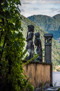 Statues adorning the terrace of a house in Nesso - Lake Como, Italy - rossiwrites.com