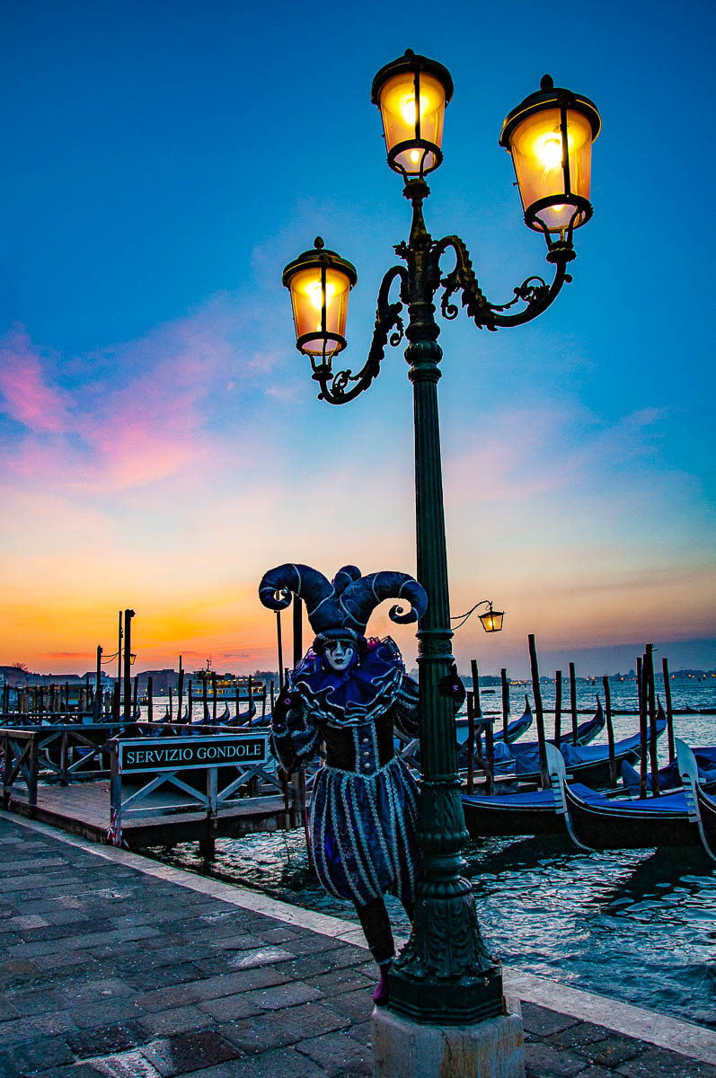 A beautiful Venetian mask under a blue and pink dawn - Venice, Italy - rossiwrites.com