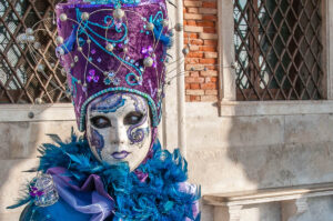 A beautiful mask in front of the Doge's Palace - Venice, Italy - rossiwrites.com
