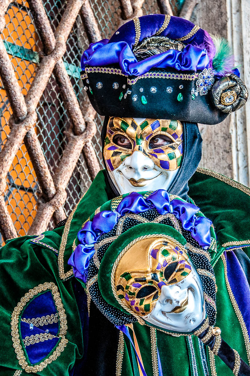 A fun mask in the portico of the Doge's Palace - Venice, Italy - rossiwrites.com