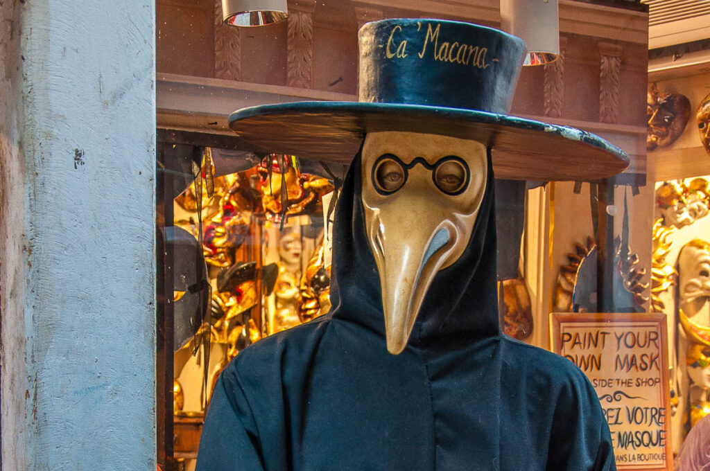 A real-size Plague Doctor Mask in front of the Ca Macana shop - Venice, Italy - rossiwrites.com