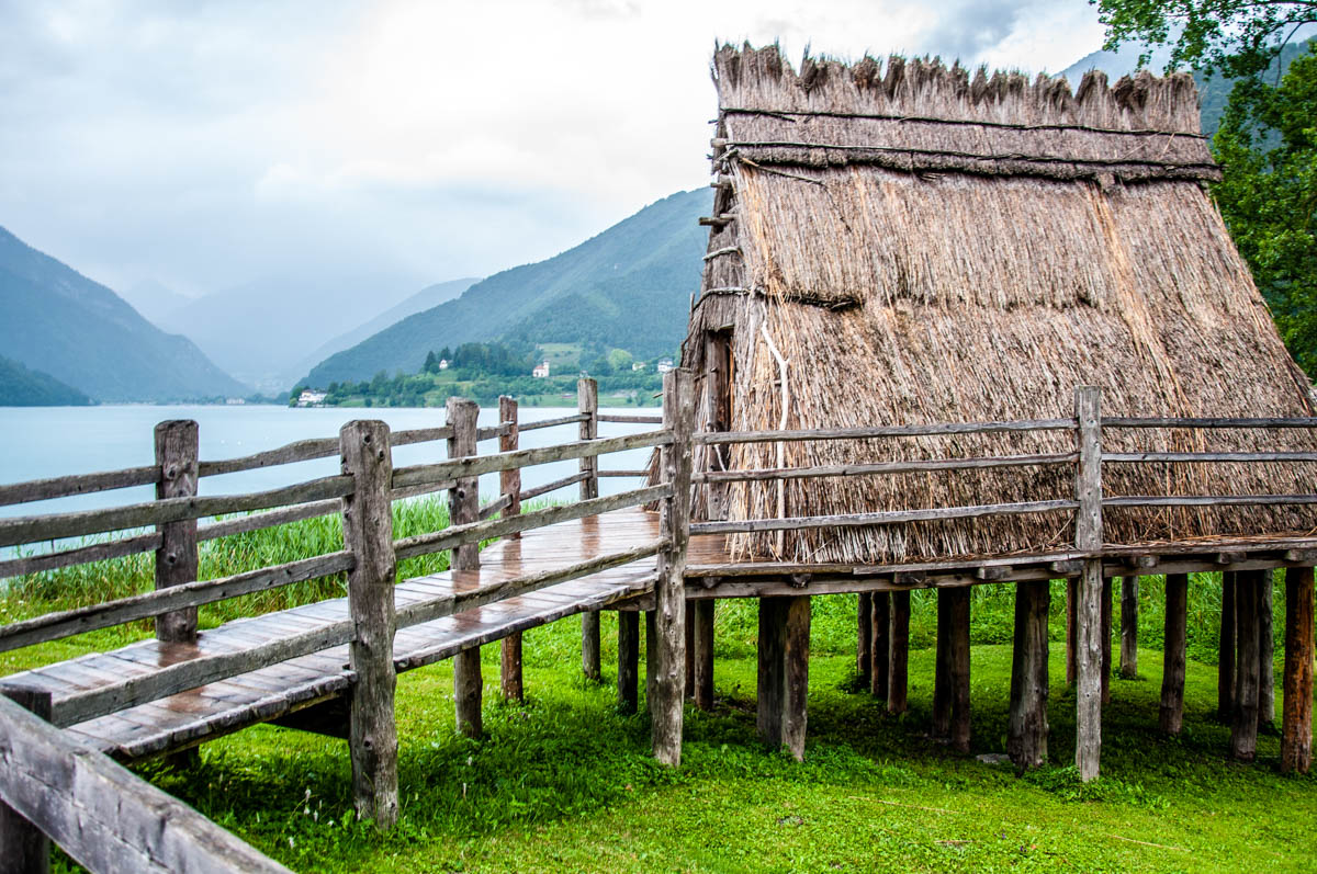 Lake Ledro with the recreated prehistoric stilt house - Trentino, Italy - rossiwrites.com