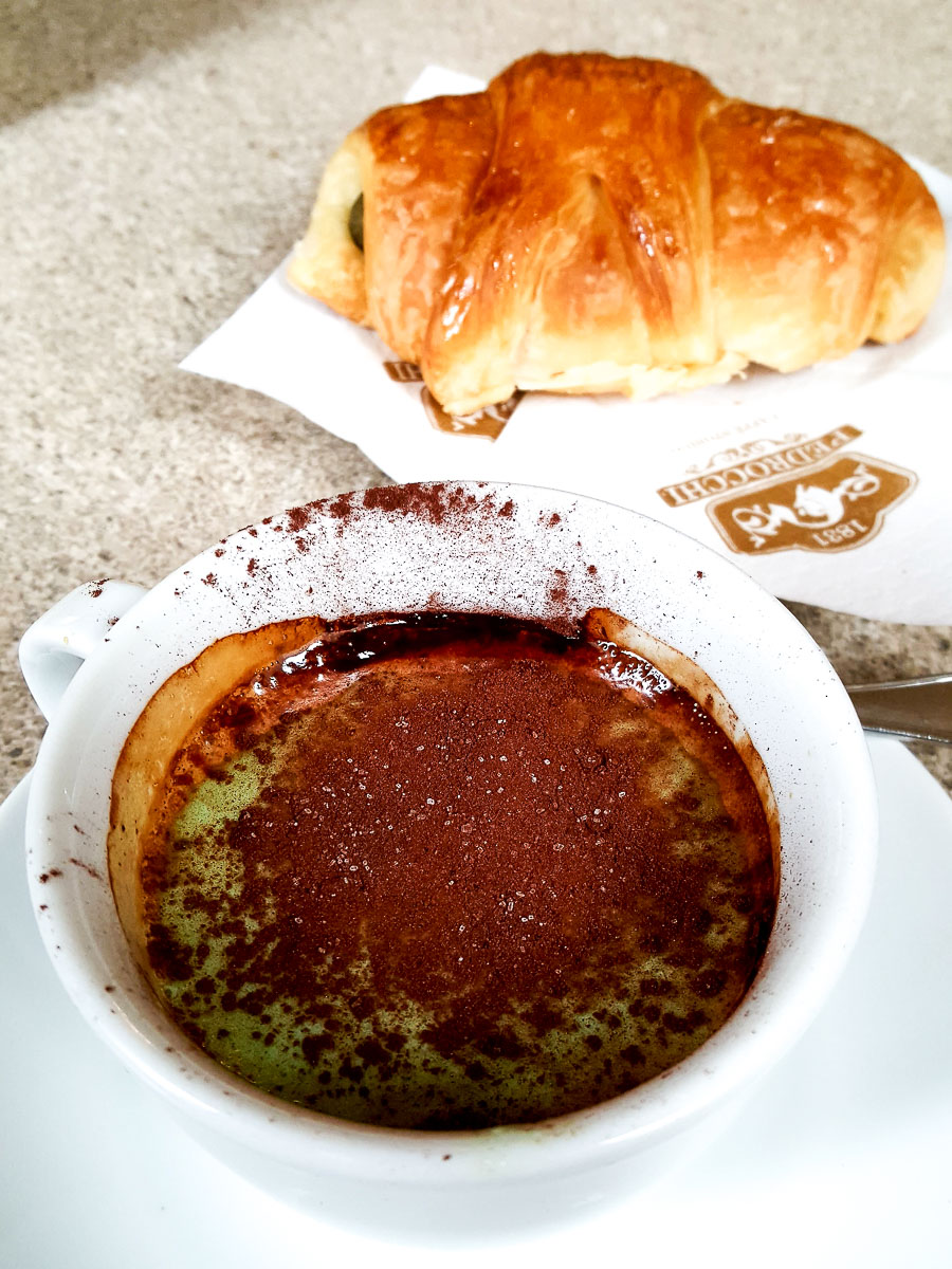 A Pedrocchi coffee served with a pastry - Caffe Pedrocchi - Padua, Italy - rossiwrites.com