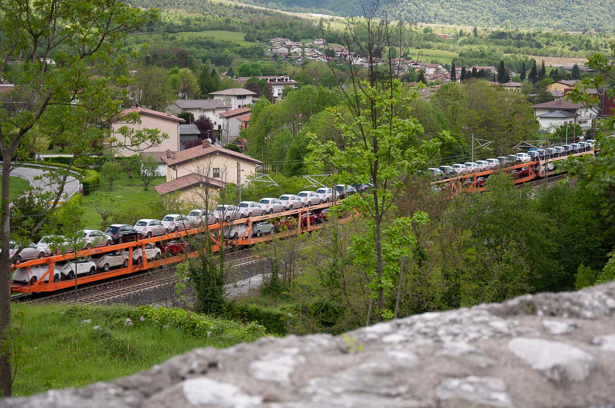 A freight train loaded with new cars - Venzone, Italy - rossiwrites.com