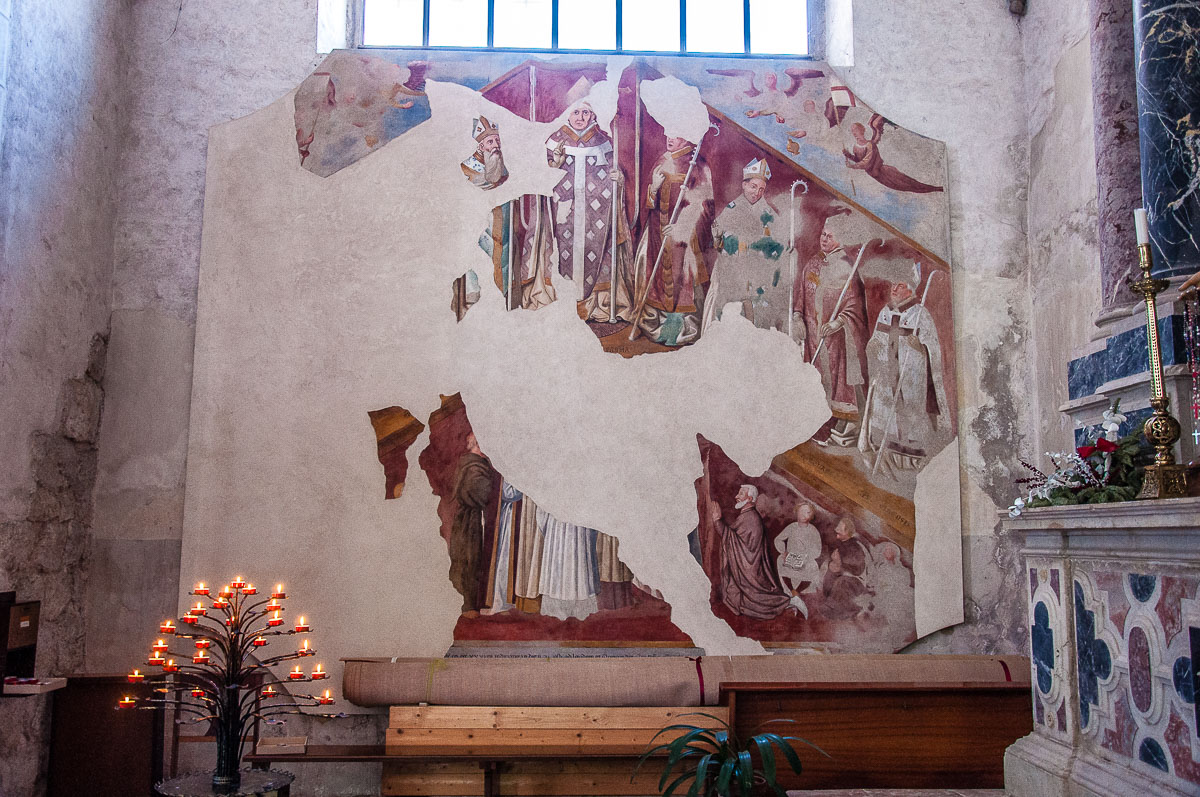Damaged fresco inside the Cathedral of San Andrea Apostolo - Venzone, Italy - rossiwrites.com