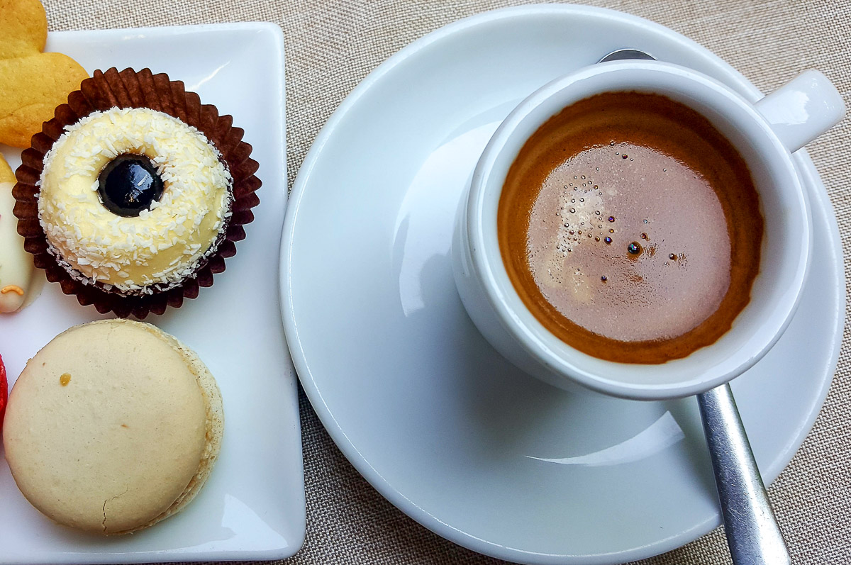 Espresso served with sweets - Vicenza, Italy - rossiwrites.com