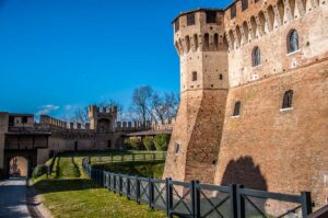 Gradara Castle with the surrounding defensive wall - Gradara, Italy - rossiwrites.com