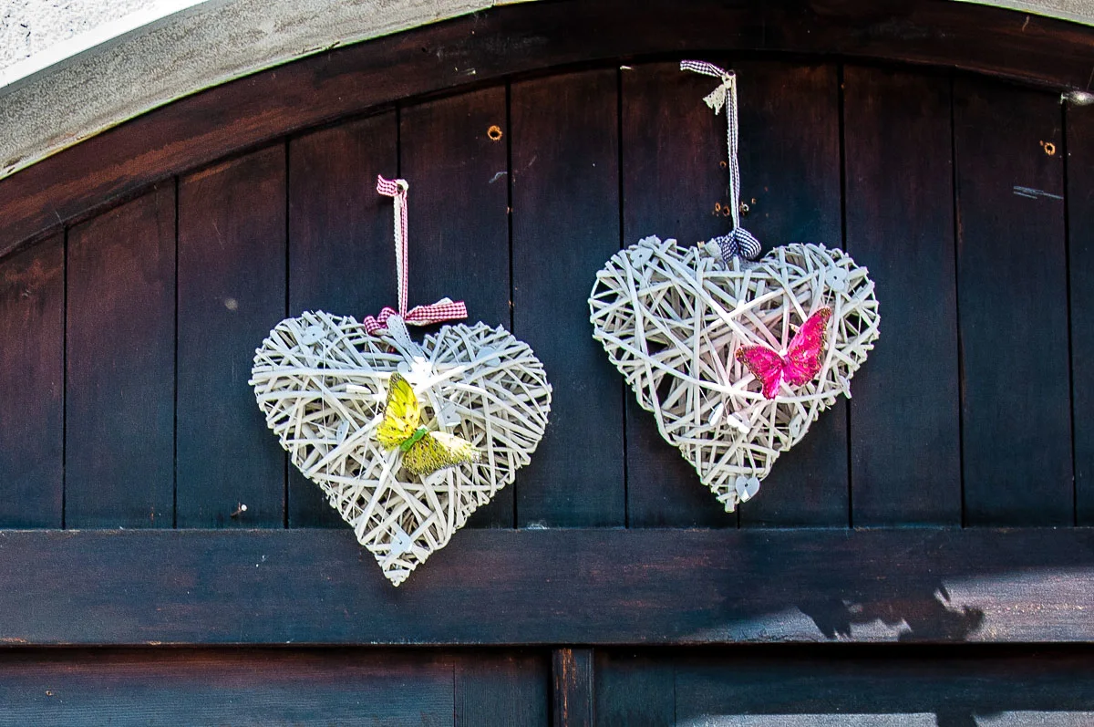 Two hearts adorning the gate of an old house - Venzone, Italy - rossiwrites.com