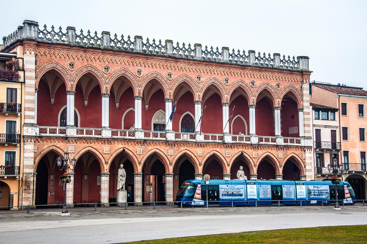 Loggia Amulea next to Prato della Valle with a passing tram - Padua, Italy - rossiwrites.com