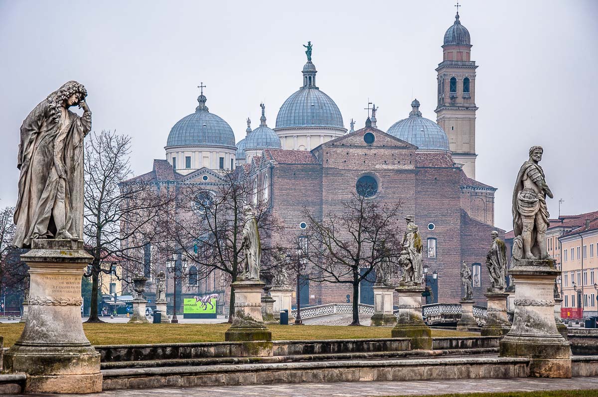 Statues on Prato della Valle with the Basilica of Santa Giustina - Padua, Italy - rossiwrites.com