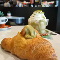 Large brioche with pistacchio spread served in a local caffe - Padua, Italy - rossiwrites.com