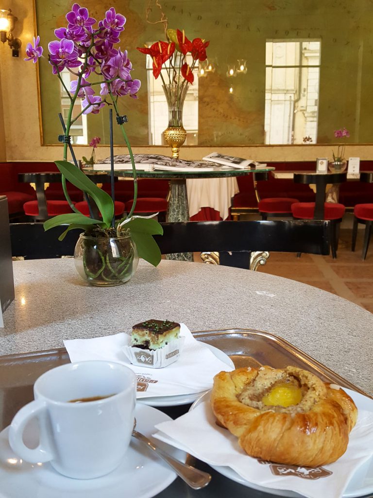 Typical Italian breakfast of coffee and pastry served in Caffe Pedrocchi - Padua, Italy - rossiwrites.com
