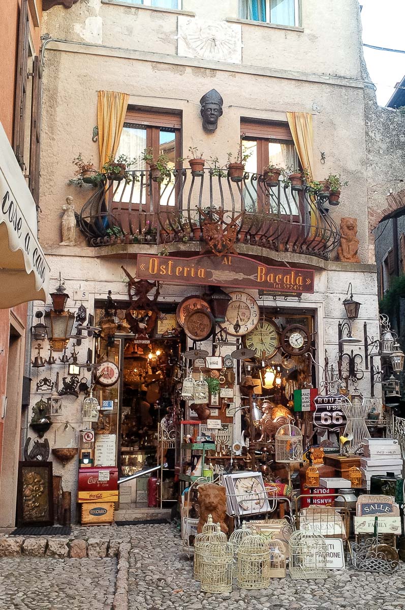 A bric-a-brac shop in the historic centre - Malcesine, Italy - rossiwrites.com