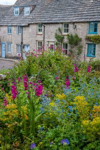 A gorgeous garden and traditional stone cottages in the village of Worth Matravers - Dorset, England - rossiwrites.com