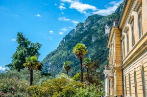 Yellow house surrounded by lush vegetation - Riva del Garda, Italy - rossiwrites.com