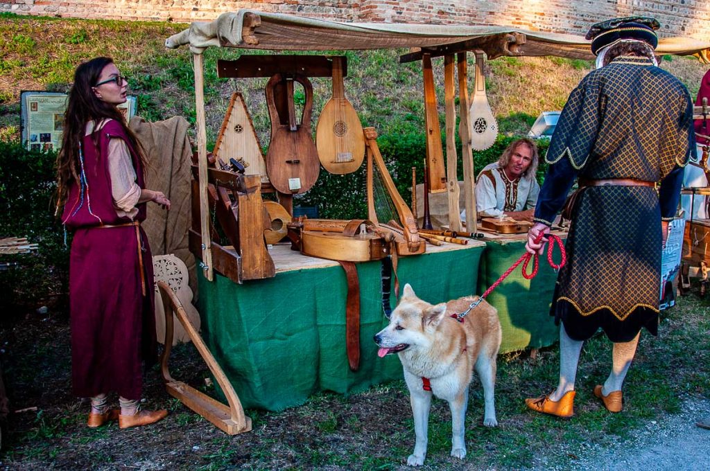 A stall with historical music instruments at the medieval reenactment - Cittadella, Italy - rossiwrites.com