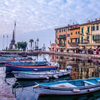 The historic harbour of the town of Lazise on Lake Garda - Veneto, Italy - rossiwrites.com