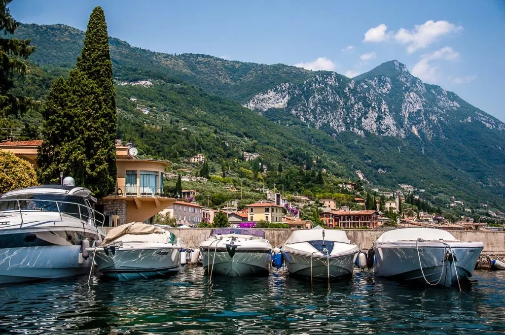 Motorboats moored in the lakefront town of Gargnano - Lake Garda, Italy - rossiwrites.com