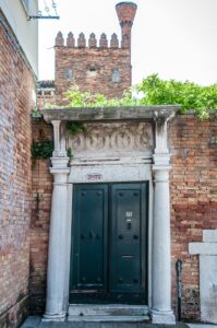 A large gate with a four-digit house number - Venice, Italy - rossiwrites.com