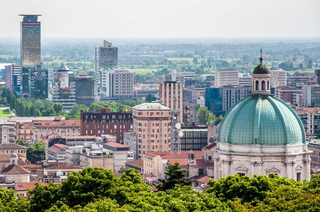 Skyscrapers and the Duomo Nuovo seen from Cidneo Hill - Brescia, Italy - rossiwrites.com