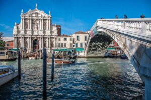 The Ponte degli Scalzi and the Basilica of Santa Maria of Nazareth near the Venezia Santa Lucia train station - Venice, Italy - rossiwrites.com