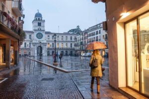 Rainy evening on Piazza dei Signori in Padua, Italy - rossiwrites.com