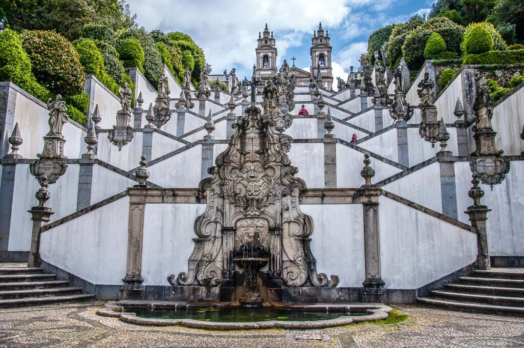 A fountain and the flights of steps leading to the Sanctuary of Bom Jesus do Monte - Braga, Portugal - rossiwrites.com