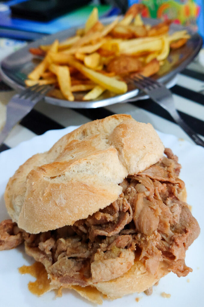 Bifana served with handmade chips - Porto, Portugal - rossiwrites.com