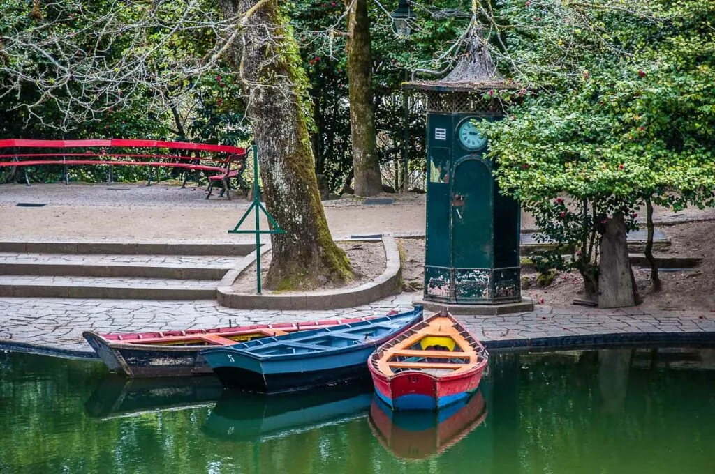 Colourful boats and a clock tower in the park behind the Sanctuary of Bom Jesus do Monte - Braga, Portugal - rossiwrites.com