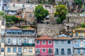 Historic houses covered with azulejos and orange trees covered in ripe fruit - Porto, Portugal - rossiwrites.com