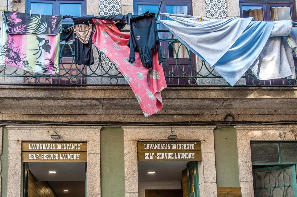 Laundromat with drying clothes in Ribeira - Porto, Portugal - rossiwrites.com