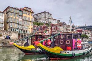 Traditional boats in the River Douro - Porto, Portugal - rossiwrites.com
