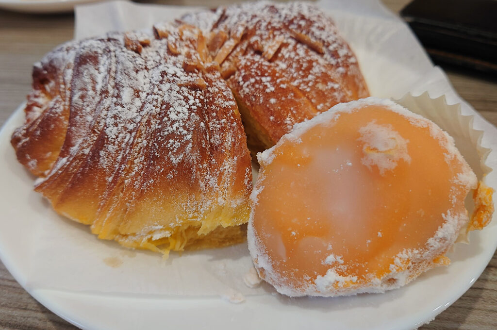 Croissant and a castanha de ovos served in a local patisserie - Porto, Portugal - rossiwrites.com