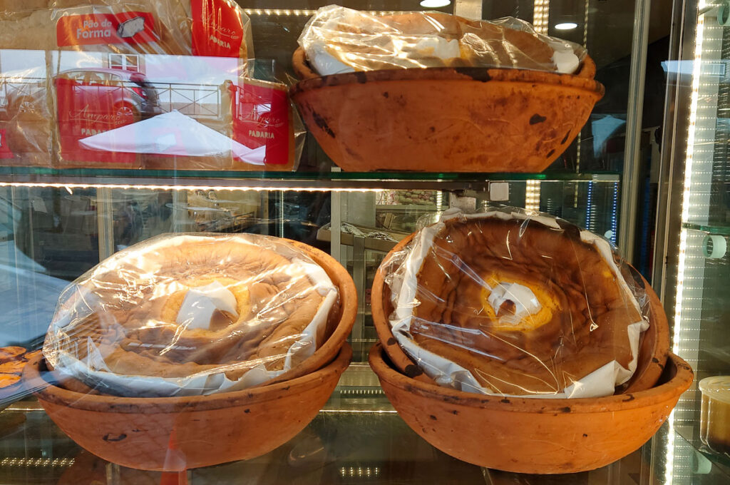 Pao de Lo in the window of a local patisserie - Porto, Portugal - rossiwrites.com