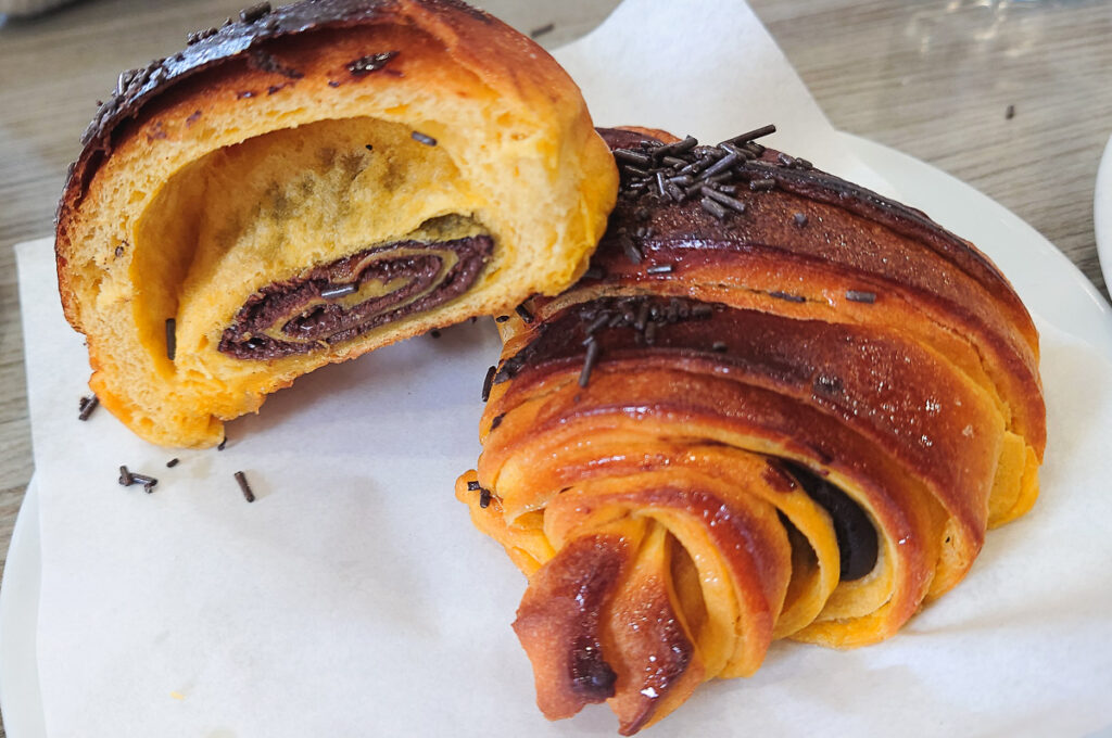 Portuguese croissant cut in two - Porto, Portugal - rossiwrites.com