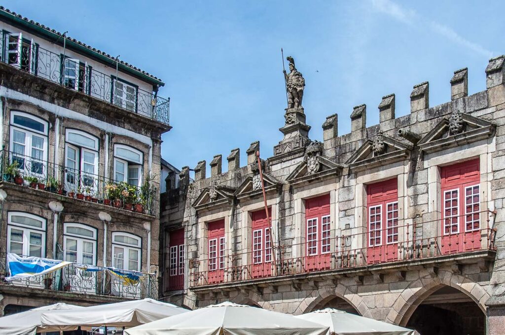 The Antigos Pacos do Concelho flanking the historic Largo da Oliveira - Guimarães, Portugal - rossiwrites.com