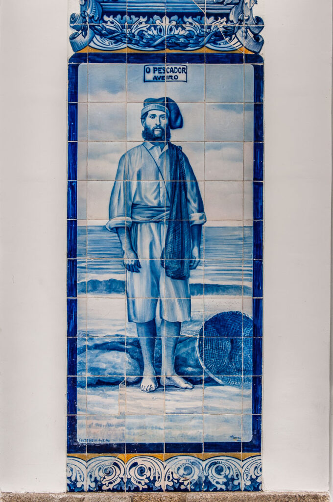 The Fisherman panel on the azulejo-covered facade of the old train station - Aveiro, Portugal - rossiwrites.com